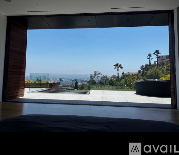 A modern house with a view of the ocean.