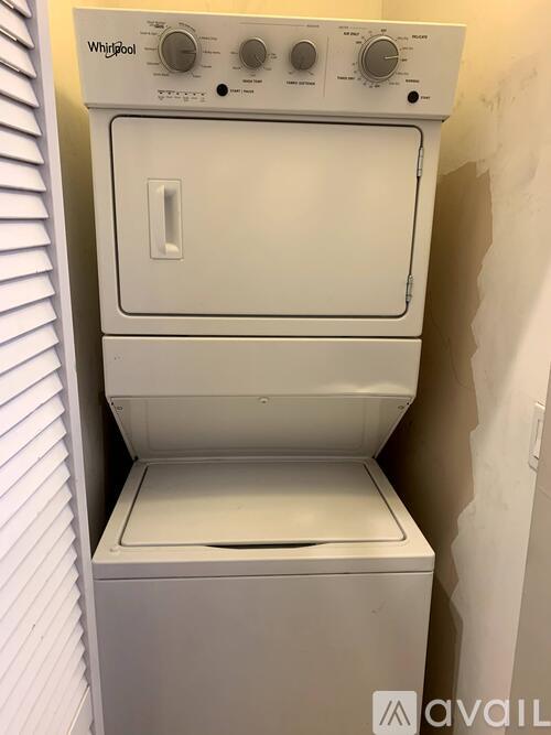 A white Whirlpool oven with the door open is available for purchase.