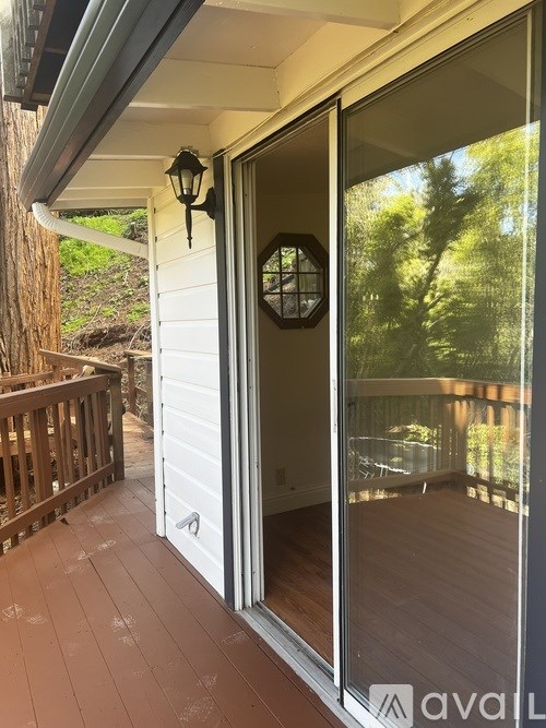 A patio door with a glass window and a black lantern on the side.