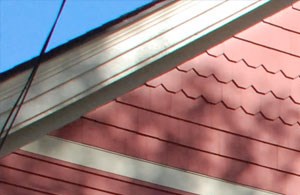 red house exterior Home exterior image red clapboard with covered stoop.