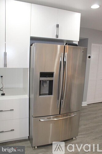 A stainless steel refrigerator with a water dispenser and ice maker is available for purchase.