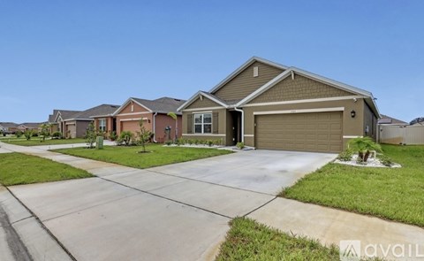 A house with a garage is available for sale.