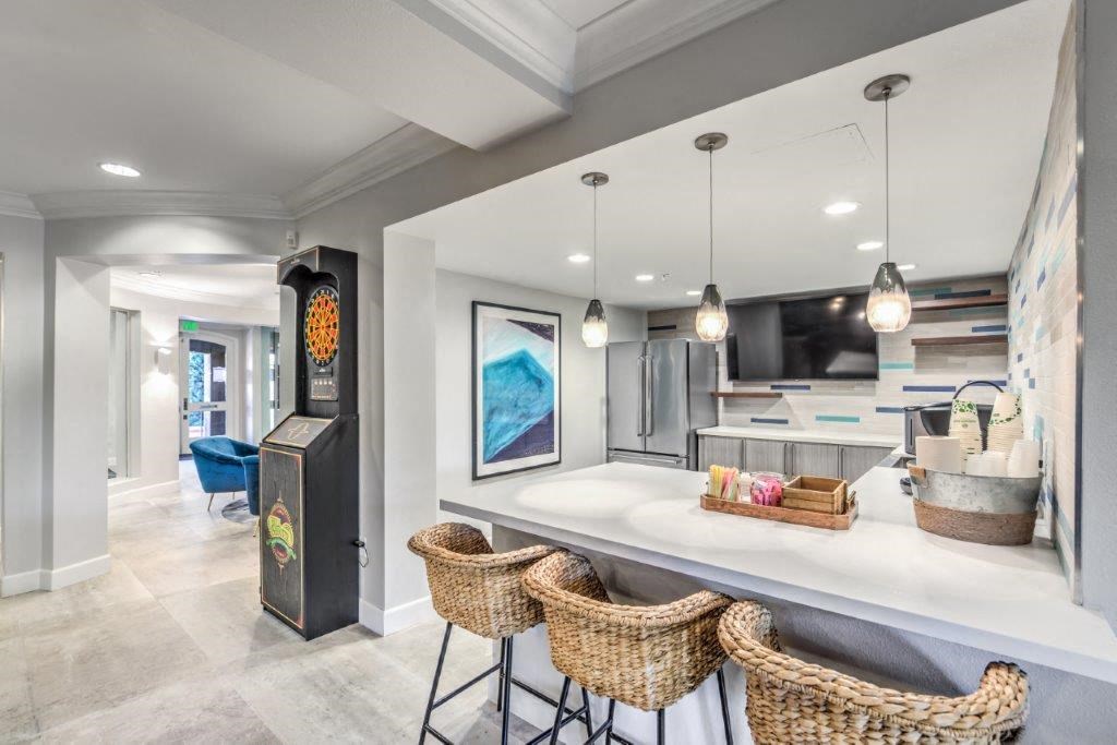 the kitchen is open to the living room and dining room