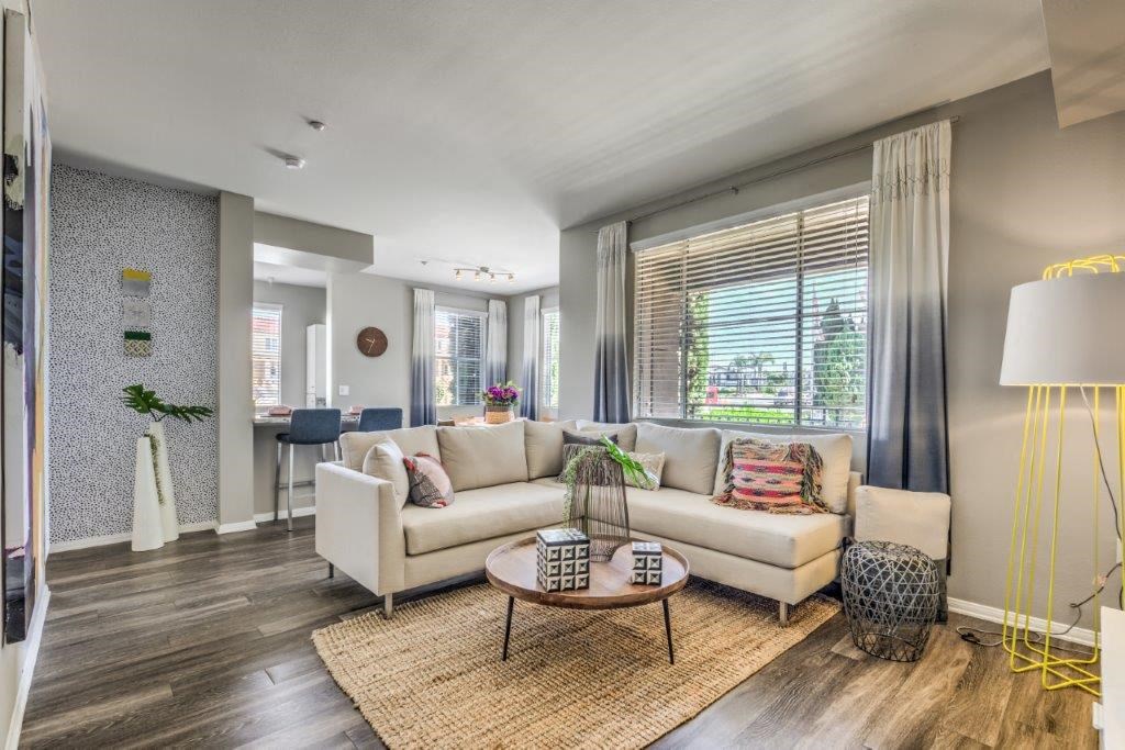 a living room with a couch and a table
