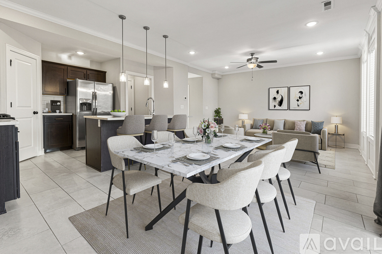 A modern dining room with a large table and chairs.