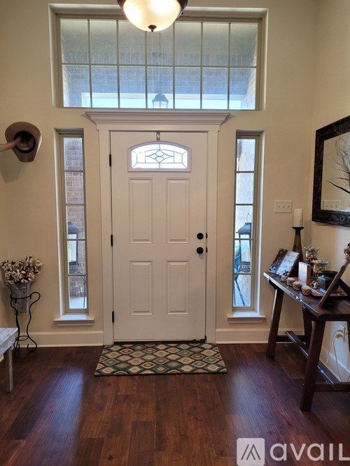 A white door with a glass window above it.