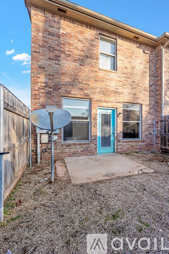 A series of images show a red brick building with a blue dumpster in front.