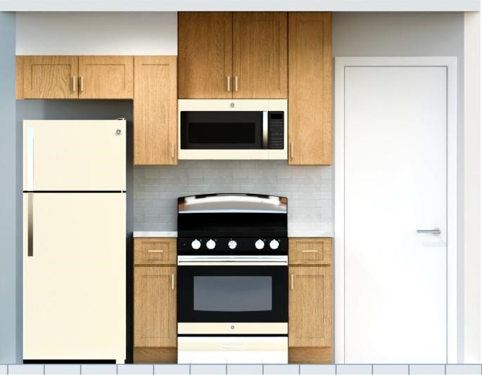 A kitchen with a white fridge, black oven, and wooden cabinets.