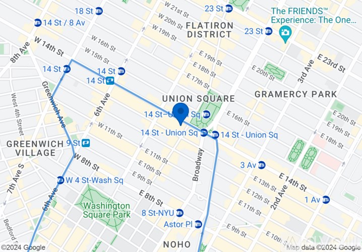 A map with a blue line indicating a route through various streets.