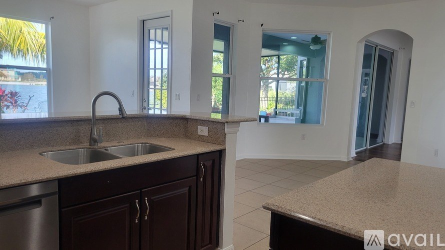 A kitchen with a sink and a countertop.