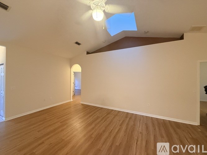 A kitchen with granite countertops and stainless steel appliances.