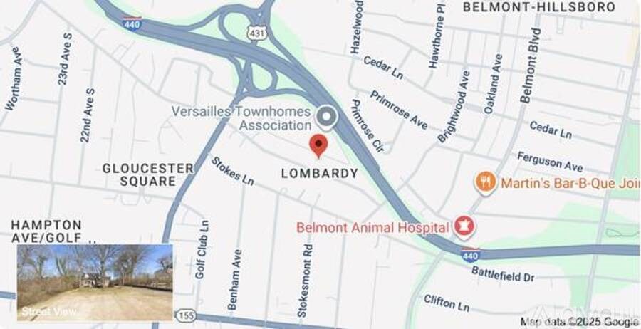 A map of a city with a red marker on it.