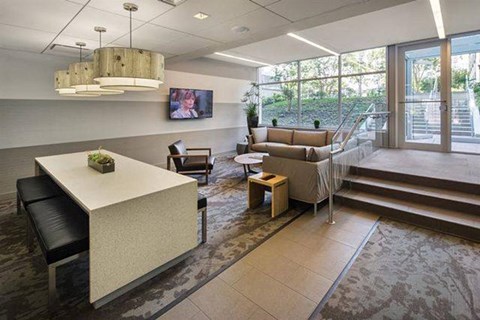 a living room with a couch and a table