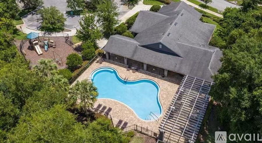 A house with a pool in the backyard.