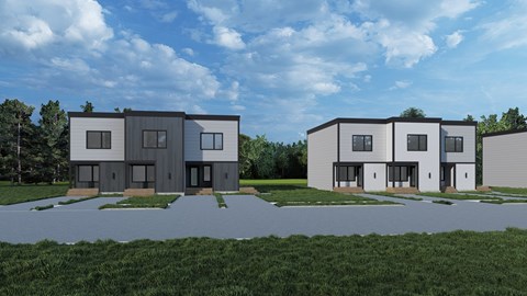 A modern two-story house with a flat roof and a garage is depicted in the image.