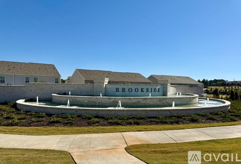 A large building with the name BROOKSIDE on it.