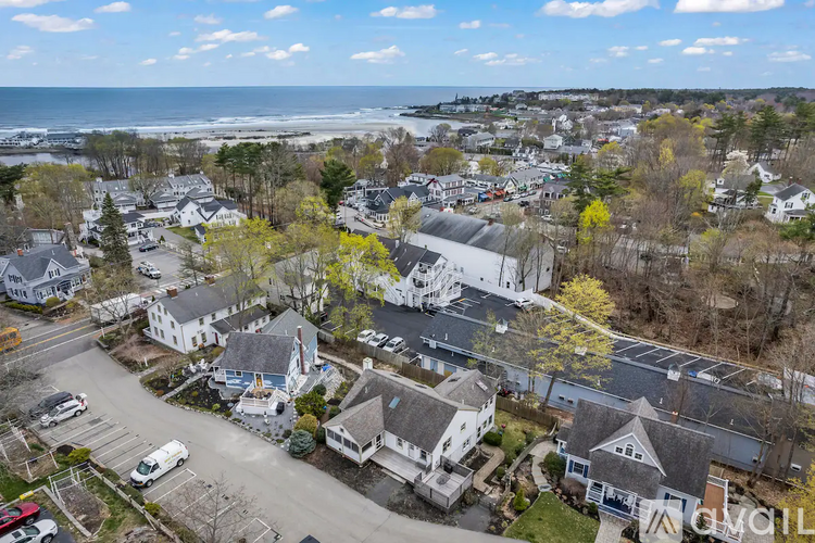 A coastal town with a mix of residential and commercial buildings.