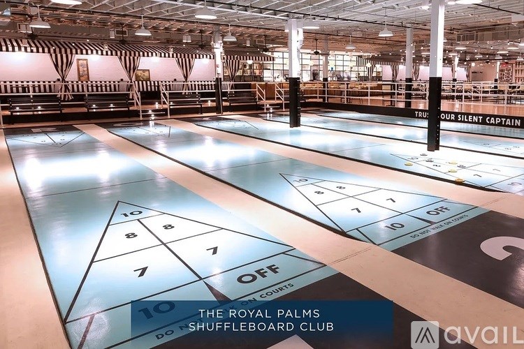A shuffleboard club with a sign that says "Our Silent Captain".