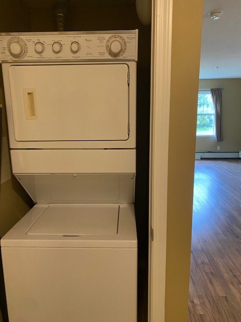 A white dishwasher is sitting in a kitchen.