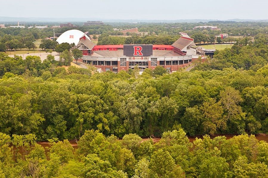 an aerial view of a building surrounded by trees