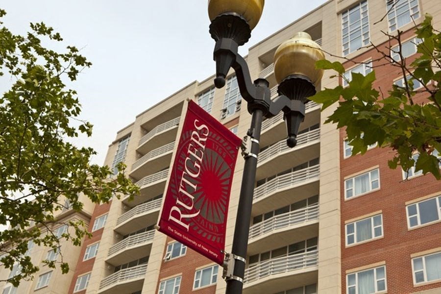 a street light with a coca cola sign on it