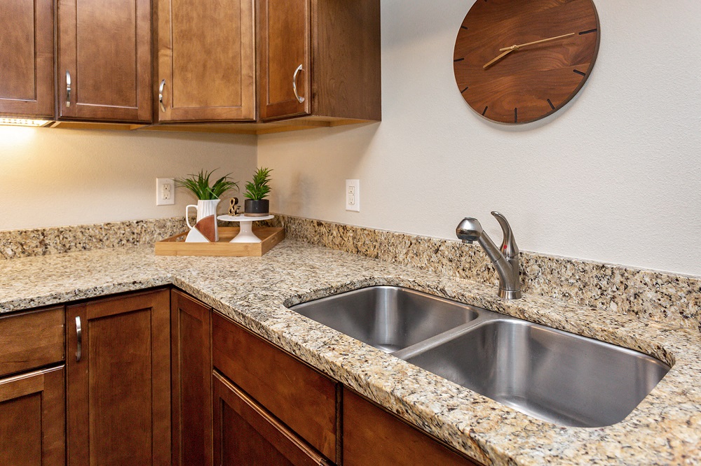 kitchen counters with sink and decorations