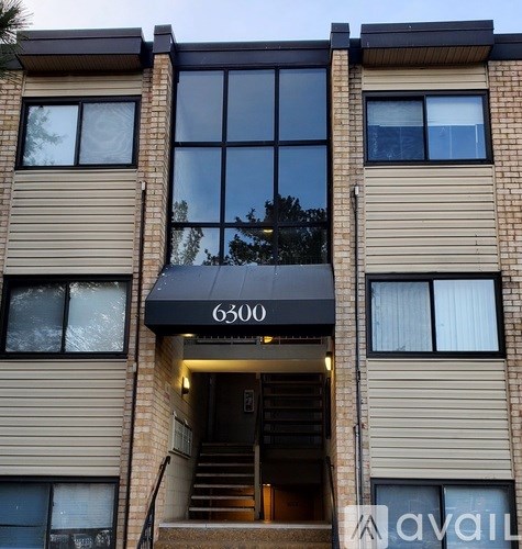 The front of a building with the number 6300 on it.