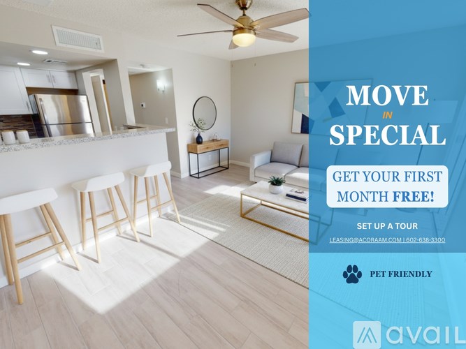 A room with a bar area and a couch with a sign offering a free first month.