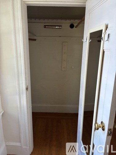 A room with a door and a window.