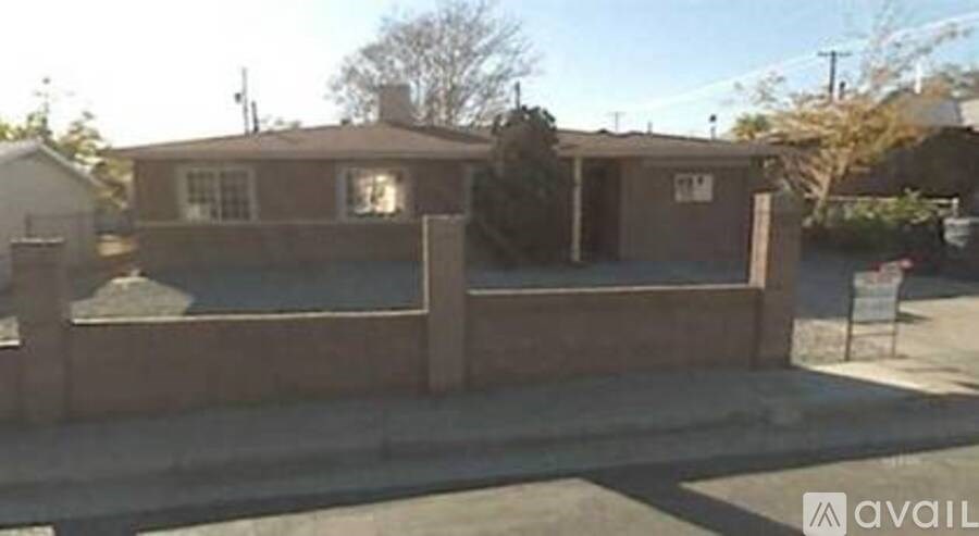 A building with a sign that says "available" in front of it.