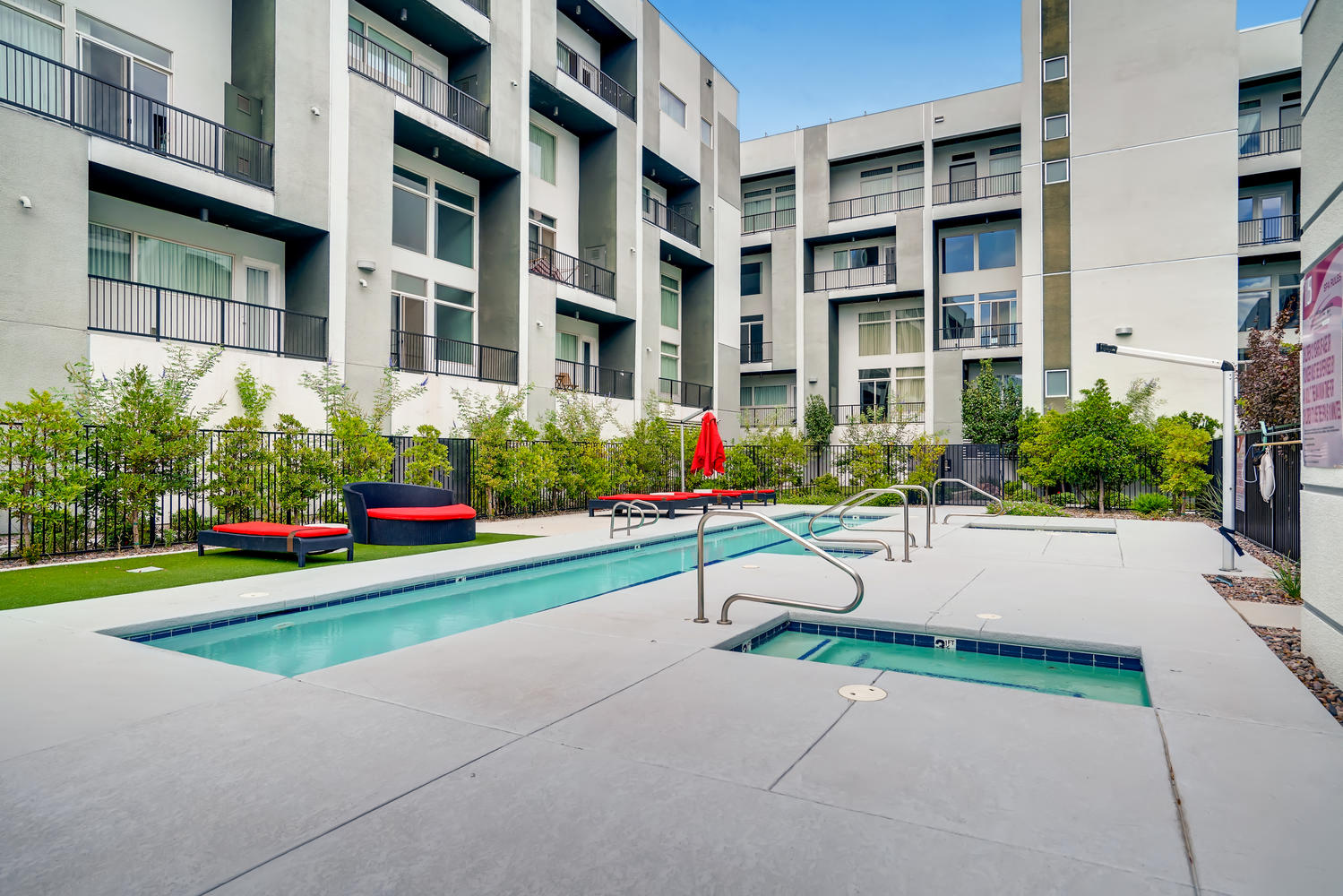 our apartments have a swimming pool and a patio with furniture
