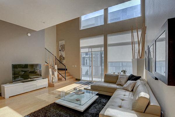 a living room with a couch and a television