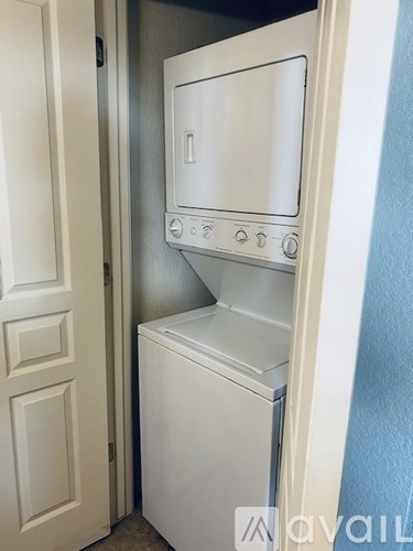 A white dishwasher is installed in a kitchen.