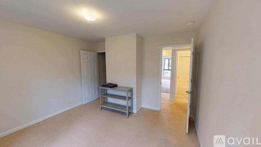 A room with a bed and a window.