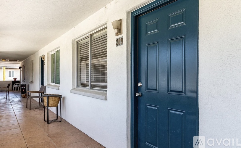 A blue door is on the right side of the image.