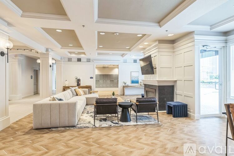 A living room with a fireplace and a couch.