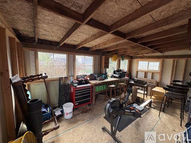 A room with a workbench and tools.