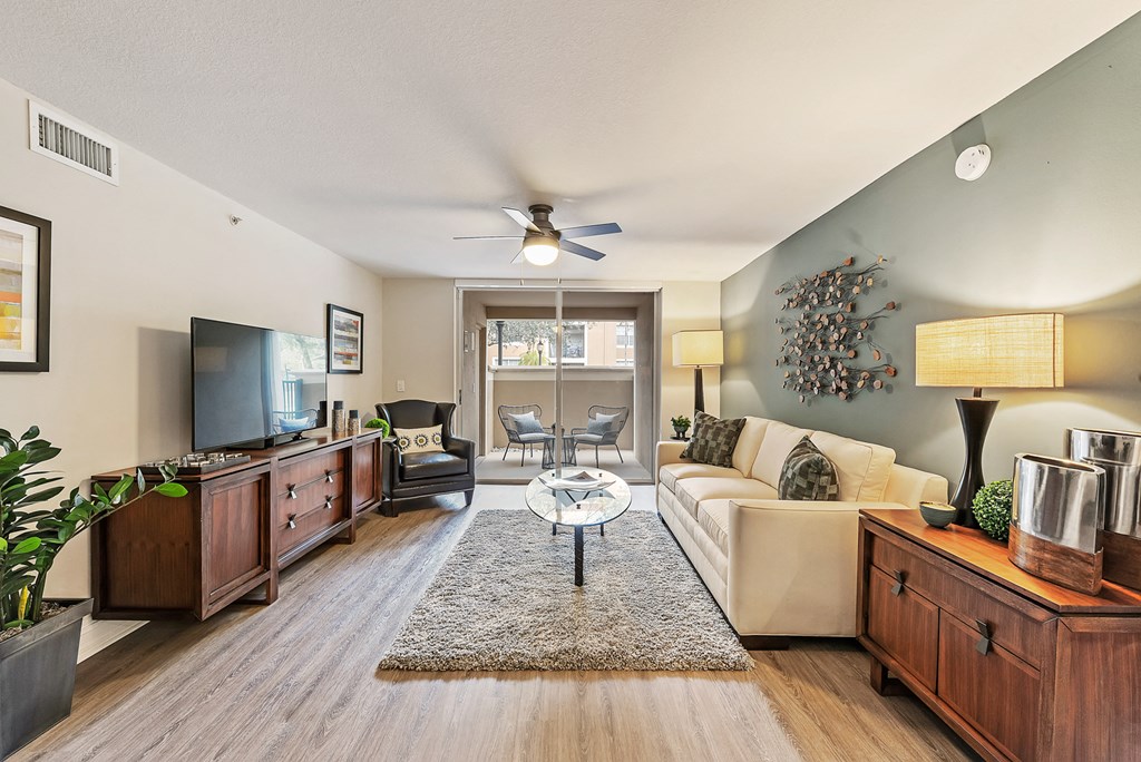 a living room with a couch and a tv