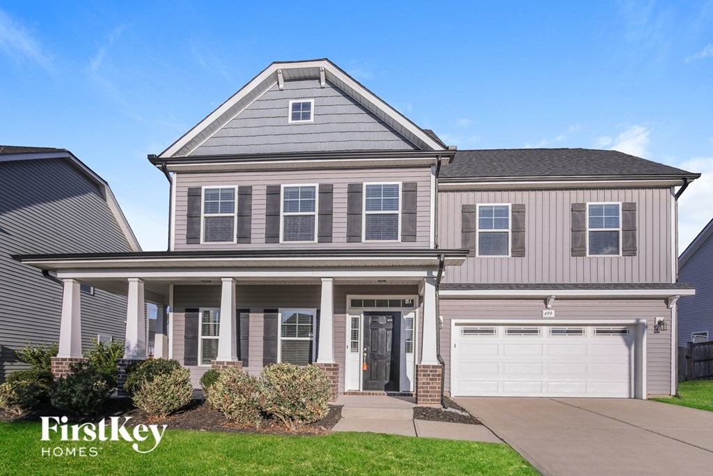 A two-story house with a garage is for sale by FirstKey Homes.