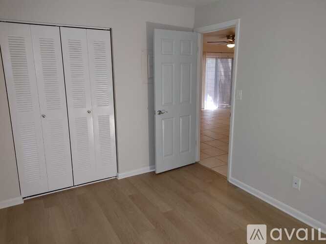 A room with white doors and a white door frame.