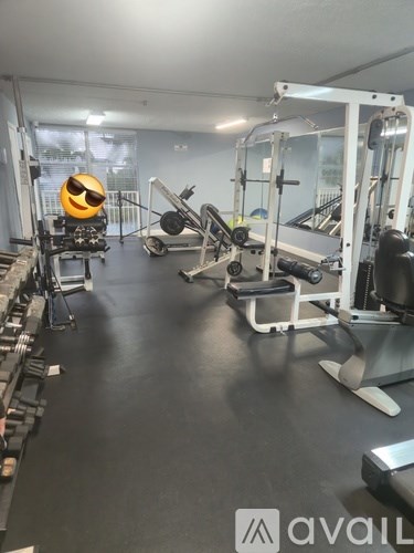 A gym with various exercise equipment and a logo that reads "avaiL".