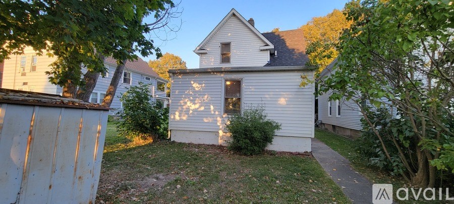 A house with a sign that says "available" in front of it.