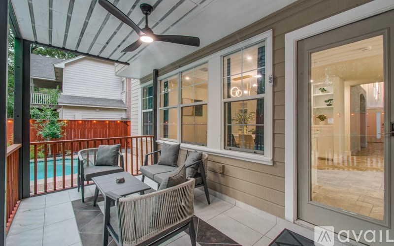 A patio with a table and chairs is shown.