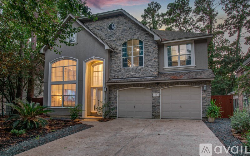 A house with a garage is available for sale.
