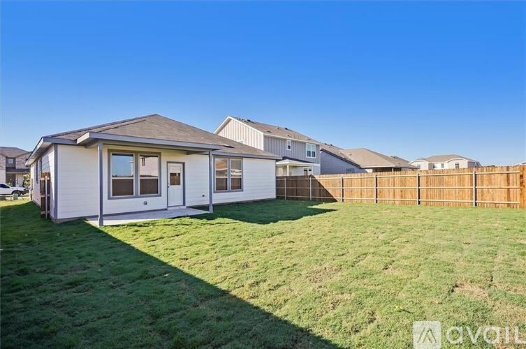 A house with a lawn in front of it is for sale.