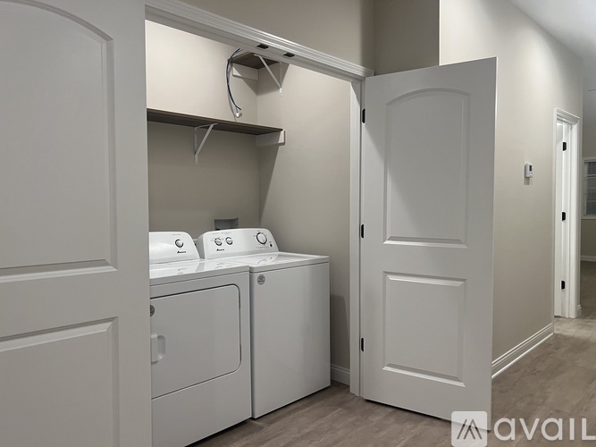 A laundry room with a washer and dryer.