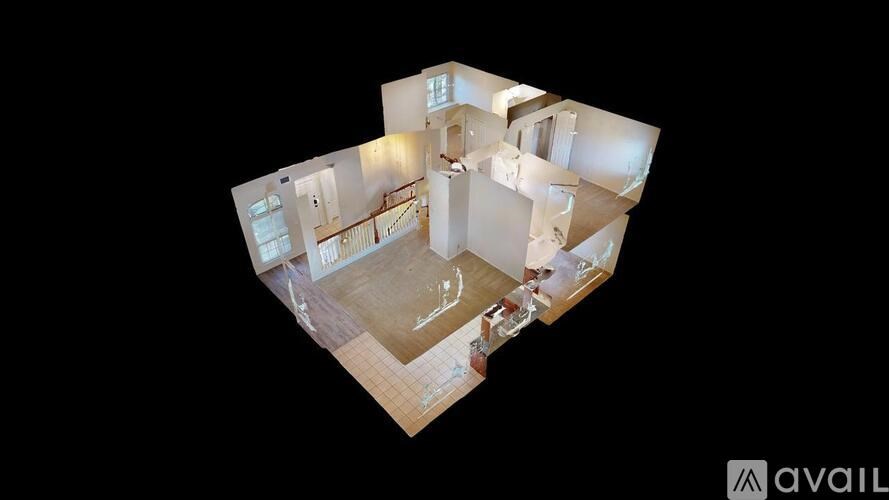 A 3D image of a house layout with a kitchen, living room, and bathroom.