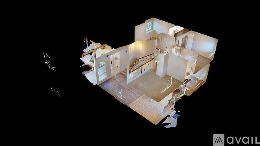 A room with a ceiling fan and a window with blinds.