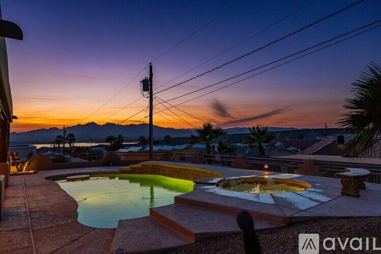 A pool with a lit candle in the middle of it.