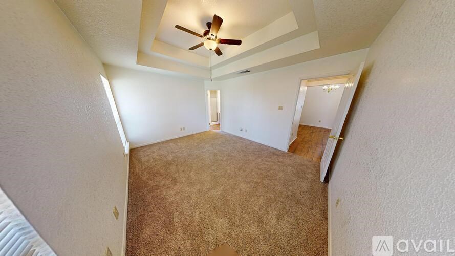 A bathroom with a toilet, sink, and shower.